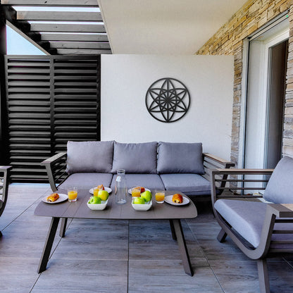 Home Wall Decor Metal Wall Art Sacred Geometry Art Vector Equilibrium in black  Outdoor on the balcony wall with a gray armchair with three seats with a comfortable cushion, wooden table on which there is a breakfast with fruit and orange juice.