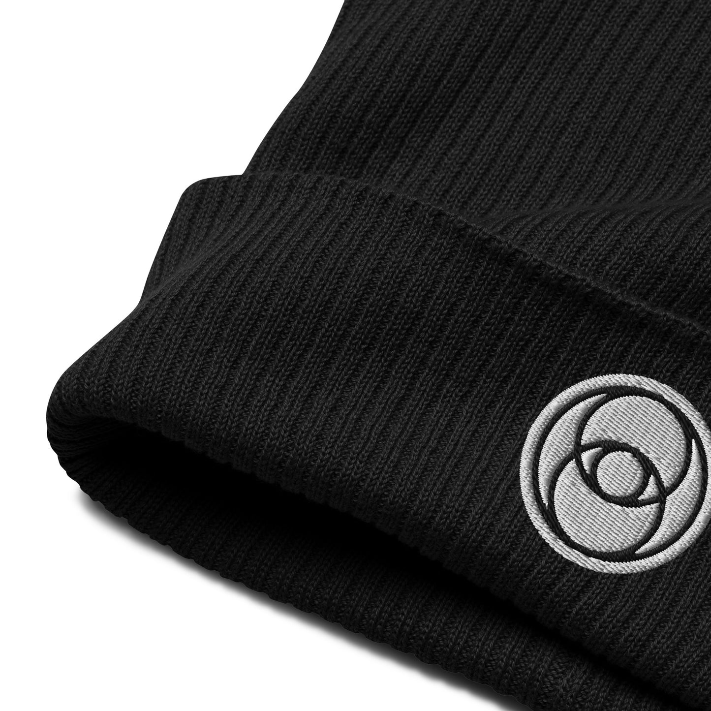  The Vesica Piscis Organic Cotton Beanie in Midnight Black is all about harmonious unions. Made of organic cotton and featuring a Vesica Piscis embroidery, this piece is something special. The Vesica Piscis symbolizes unity, balance, and connecting with the universe. Our beanies are made with breathable, lightweight fabric and natural materials, so you can stay comfy while you're exploring the mysteries of existence. Grab one of these beanies and add a touch of divinity to your style.