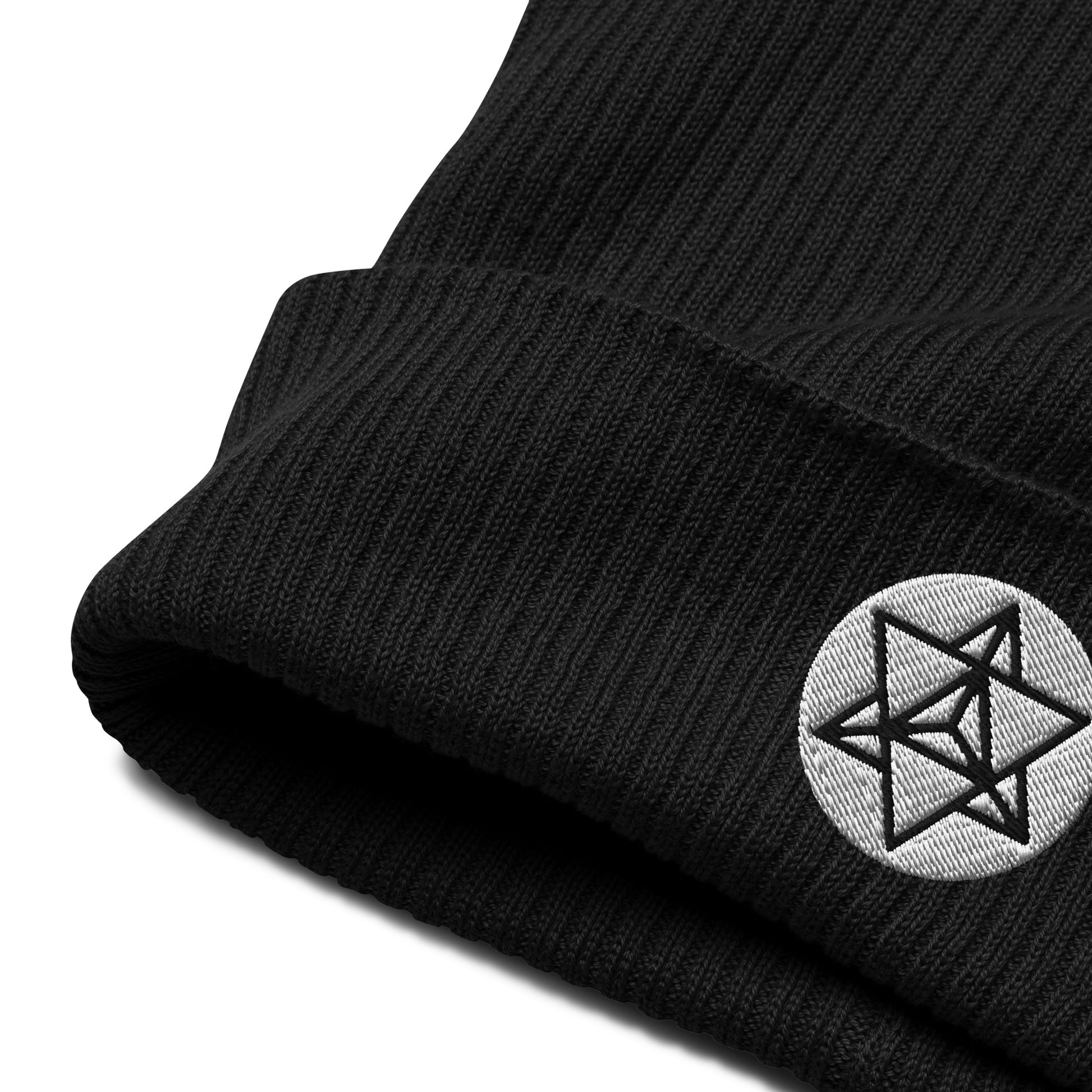 The Merkaba symbol beanie hat in Midnight Black, crafted from organic cotton and adorned with intricate embroidery. Symbolizing the journey of ascension and divine protection, the Merkaba represents profound spiritual transformation and unity of mind, body, and spirit. 