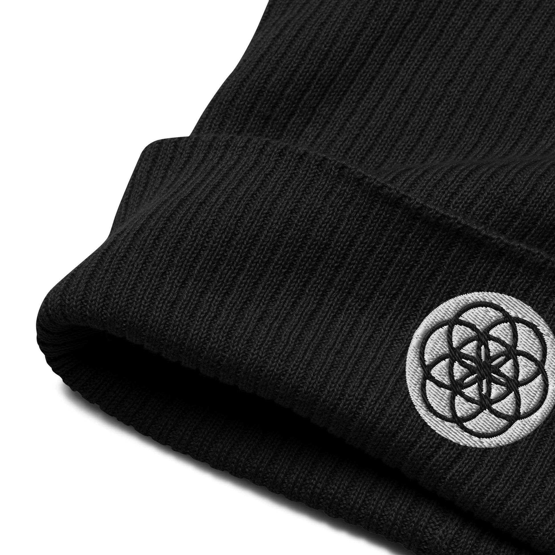 The Seed of Life beanie in Midnight Black is made from 100% organic cotton and it’s the perfect cozy addition to your energetically elevated wardrobe. The seed of life is an ancient and meaningful sacred geometry symbol that Whether you're stargazing or navigating the urban jungle, let this beanie remind you of your place in the cosmic tapestry. 