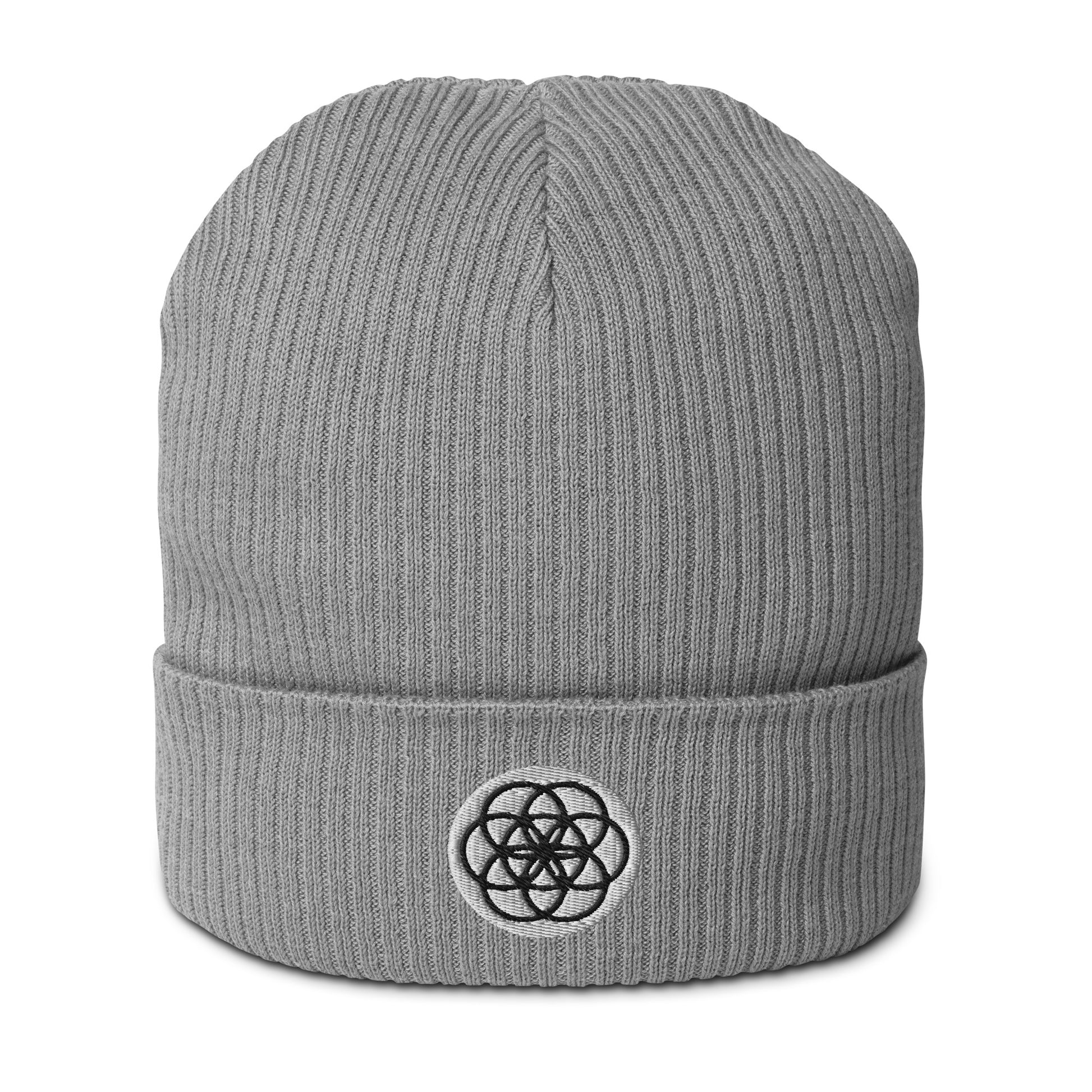 The Seed of Life beanie in Cloudy Gray is made from 100% organic cotton and it’s the perfect cozy addition to your energetically elevated wardrobe. The seed of life is an ancient and meaningful sacred geometry symbol that Whether you're stargazing or navigating the urban jungle, let this beanie remind you of your place in the cosmic tapestry.